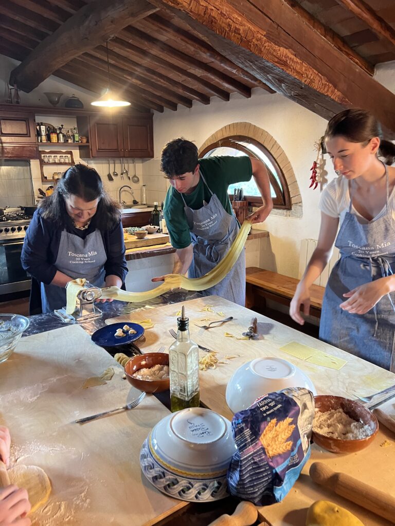 Italy travel. A hands on cooking class in Tuscany is fun for the whole family. Brenda Ajay, Allegro Luxury Vacations, Italy travel expert